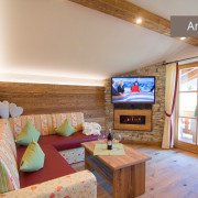 Ferienwohnung Kaiserwinkl Suite für 2 Personen mit Sitzecke, Kamin und TV